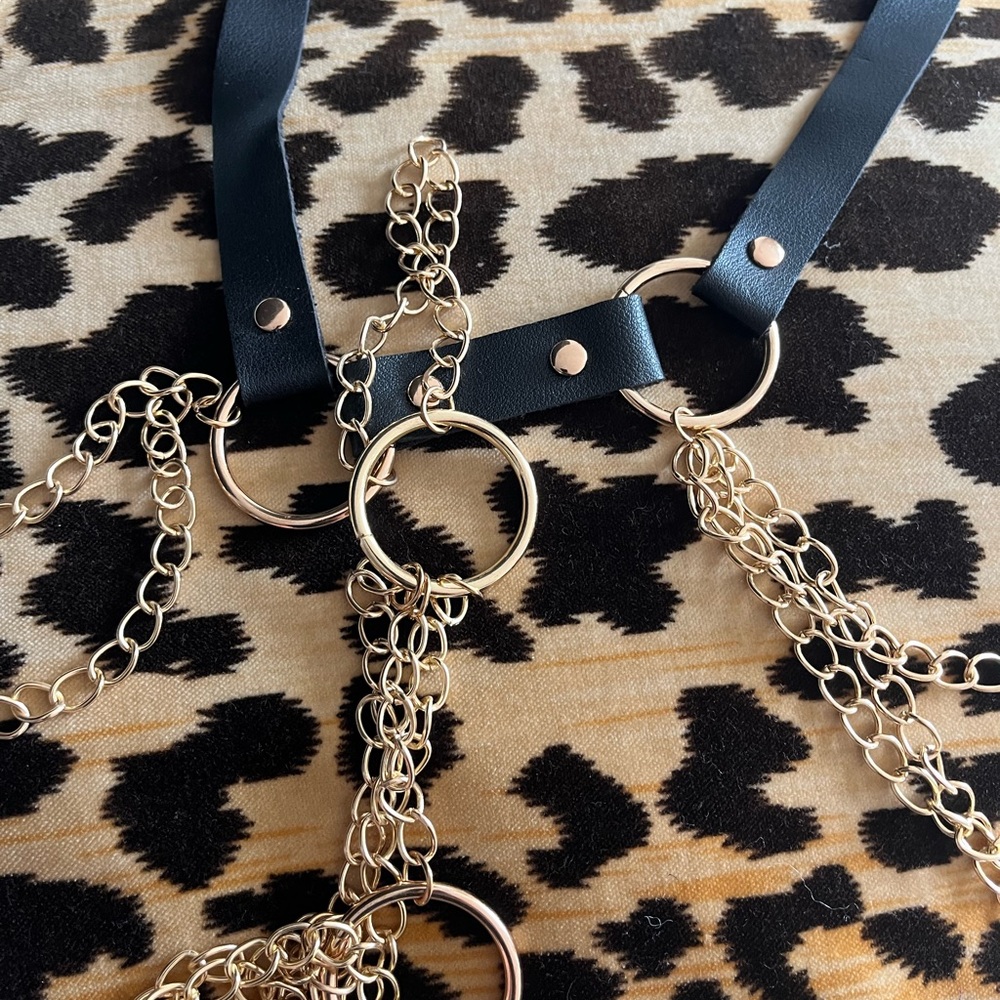 Black gold body harness